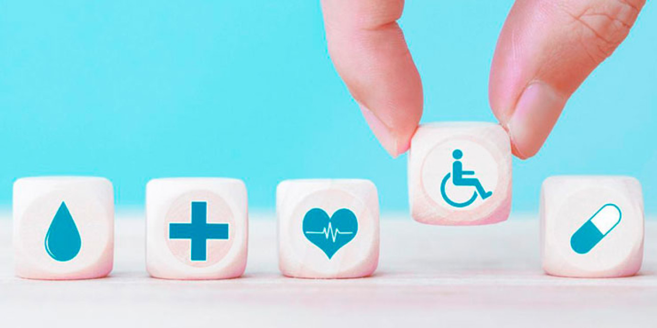 Sote-aiheisia kuutioita. Kuvituskuva.